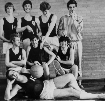 The school basketball team with me second row middle. That's the teacher with his finger up his nose! 